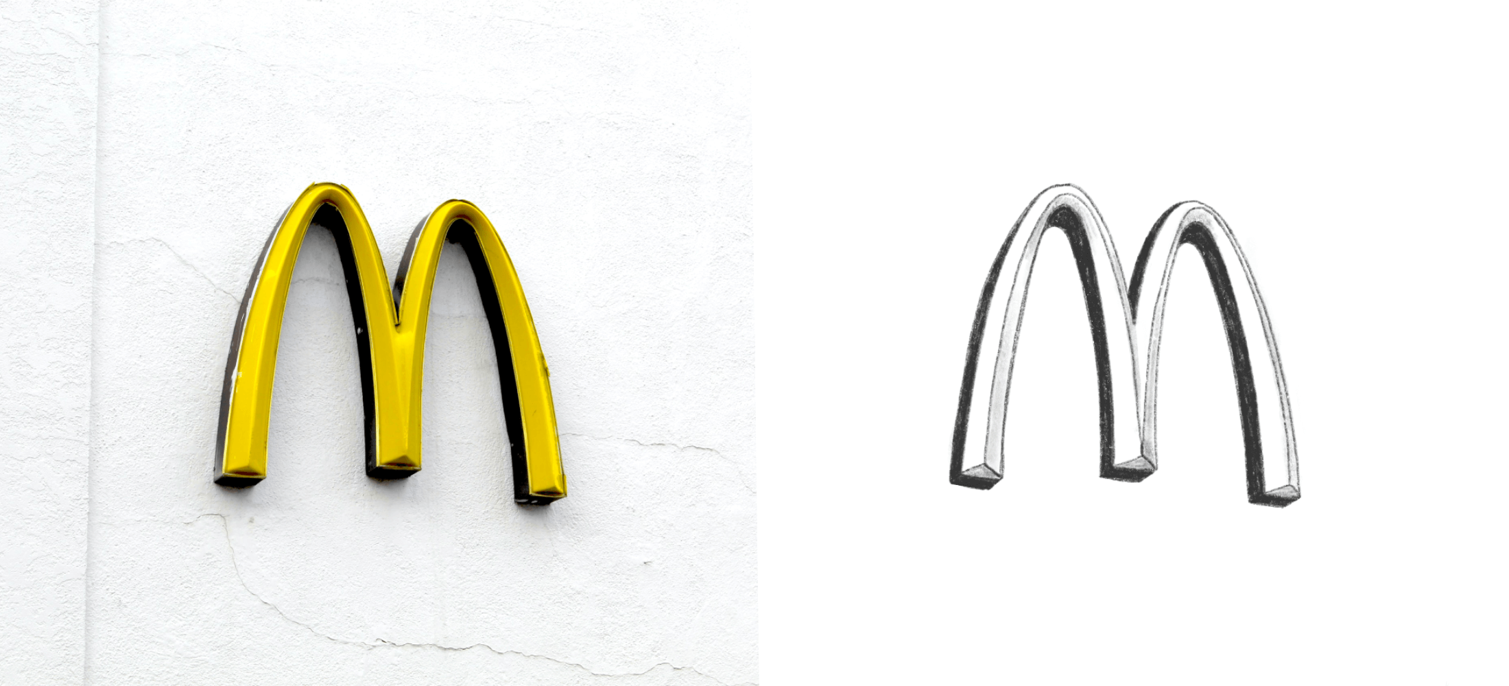 A 3D model of the McDonald's logo mounted on the wall of a McDonald's restaurant alongside a drawn version of the McDonald's logo
