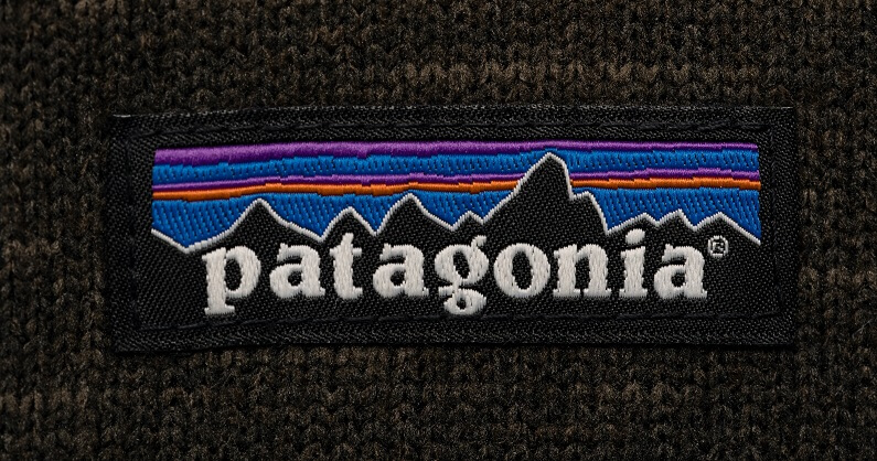 Patagonia logo tag stitched to a black Patagonia sweater